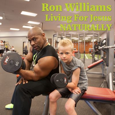 Ron Williams curiing 60lb weight mentoring boy